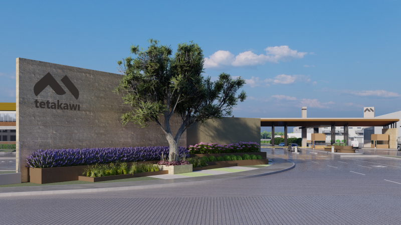 Entrance to Tetakawi's Manufacturing Community in Mazatlán, Mexico, featuring modern architecture, landscaped grounds, and industrial infrastructure