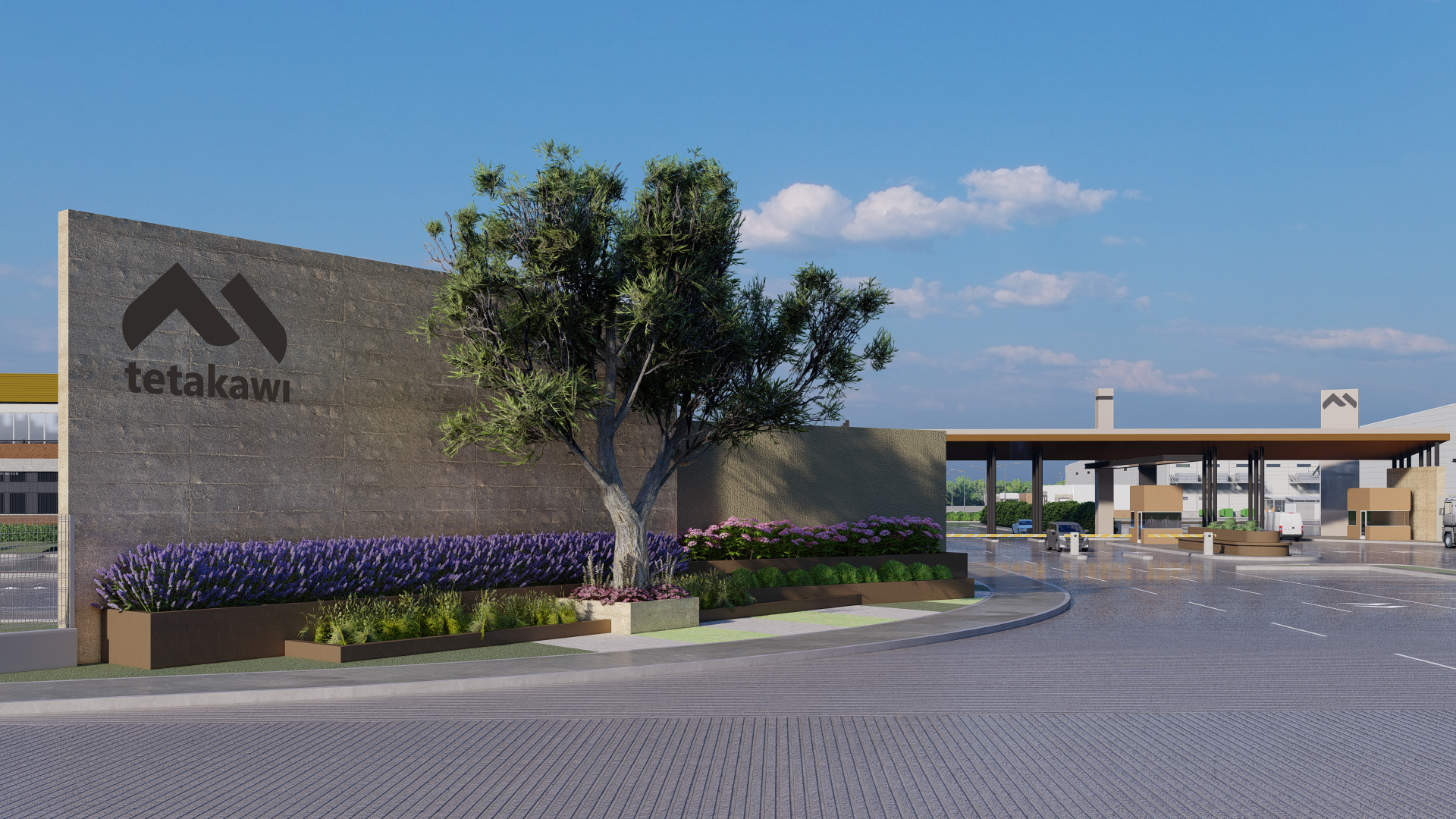 Entrance to Tetakawi's Manufacturing Community in Mazatlán, Mexico, featuring modern architecture, landscaped grounds, and industrial infrastructure