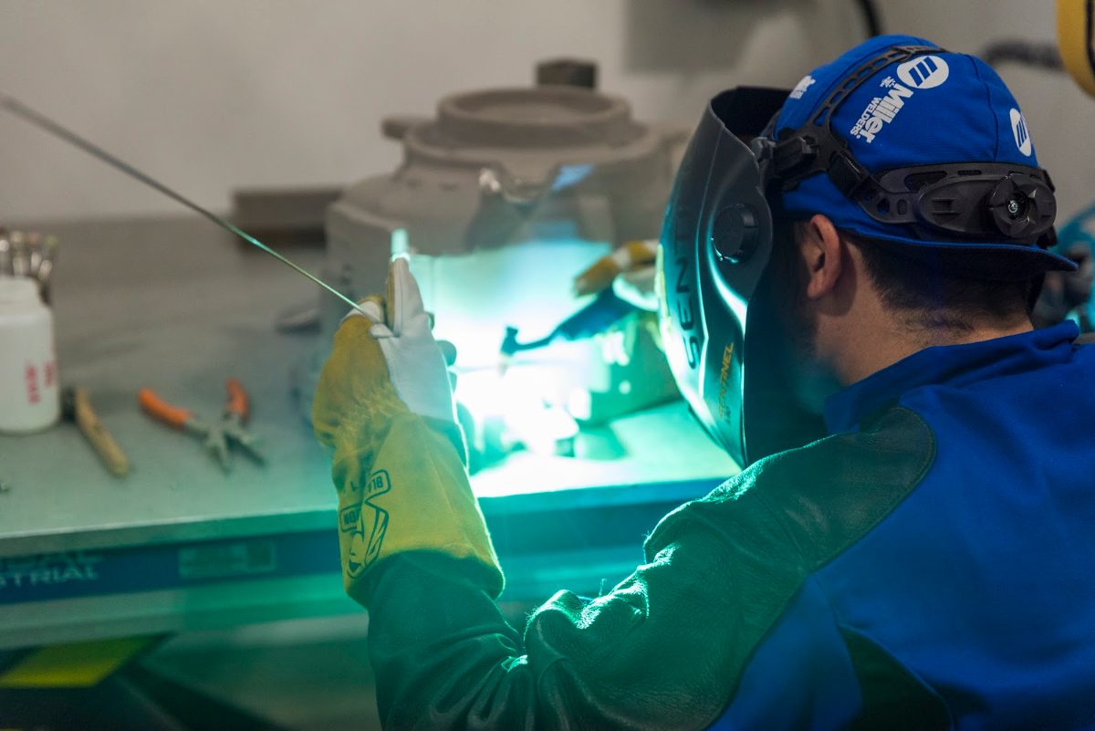 Welder performing weld repair on an aerospace casting at CPP's plant in Tetakawi's Mazatlan Manufacturing Campus